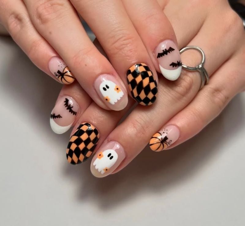 black and orange Halloween nails
